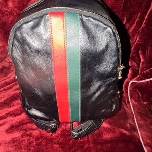 Black Leather Backpack with Red and Green Stripe
Unisex